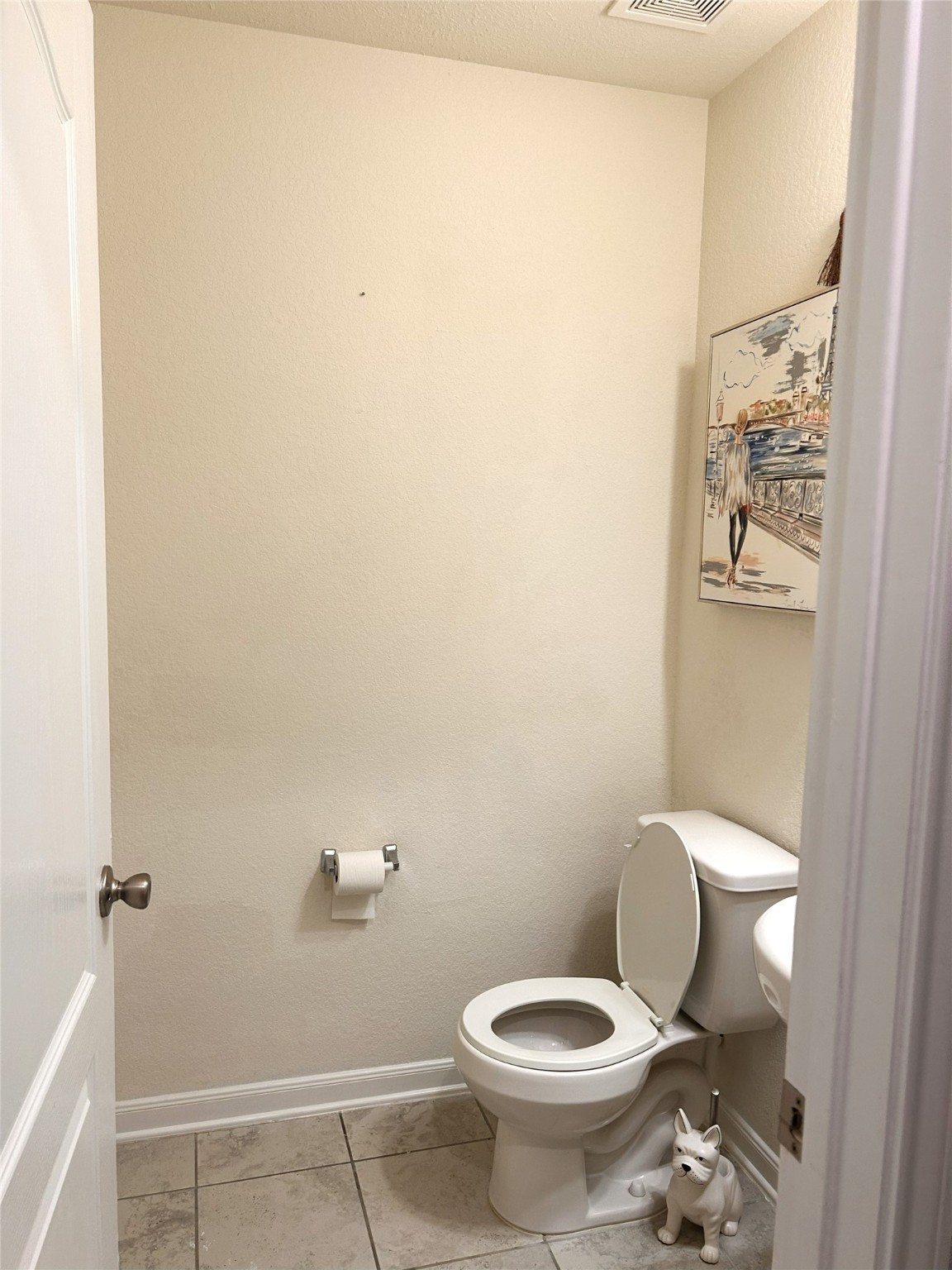 9839 Mills Field Drive Houston, TX 77070 - Photo 16 of 19 a white toilet sitting next to a small bathroom