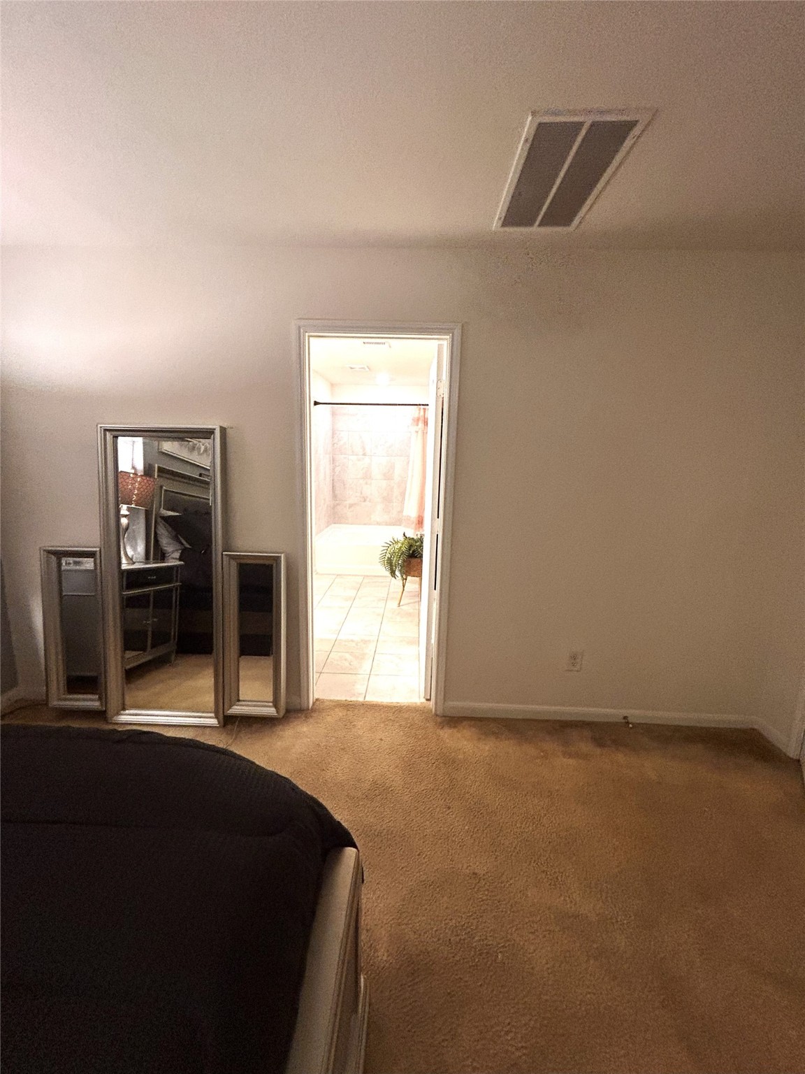 9839 Mills Field Drive Houston, TX 77070 - Photo 3 of 19 a view of an empty room with a window