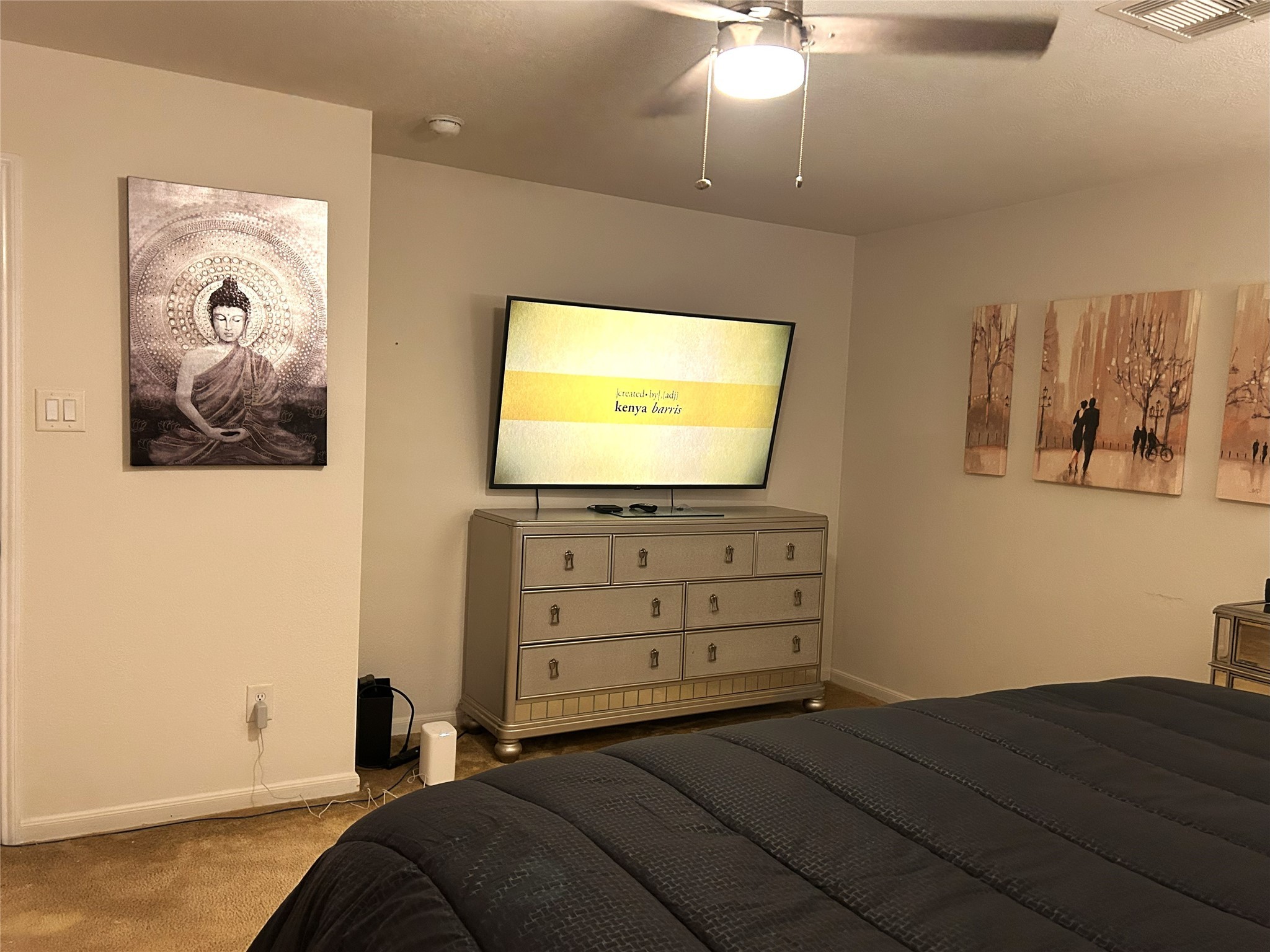 9839 Mills Field Drive Houston, TX 77070 - Photo 9 of 19 a bedroom with a bed and a flat screen tv