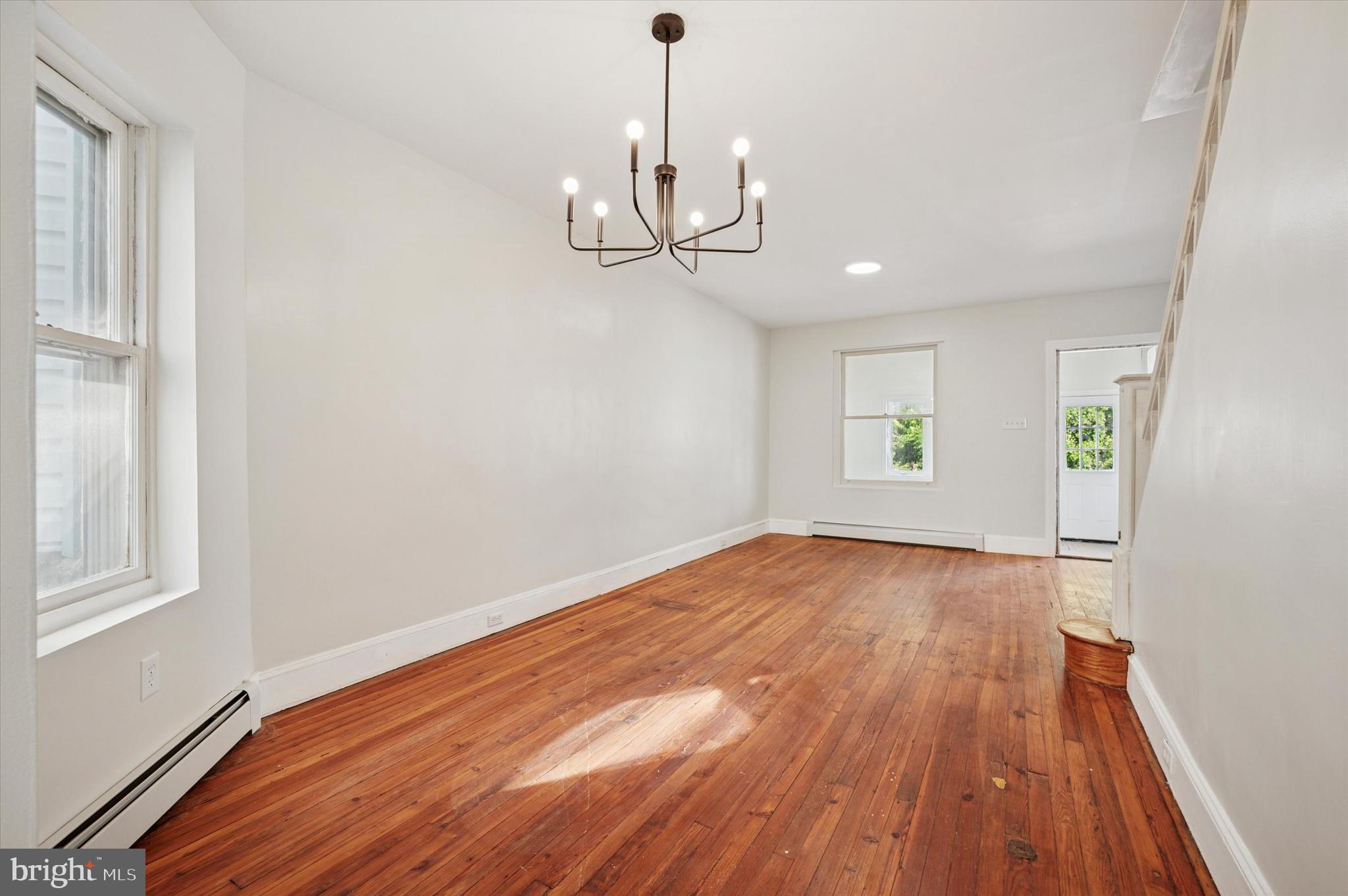 610 Martin Street Philadelphia, PA 19128 - Photo 10 of 24 a view of empty room with wooden floor and ceiling fan