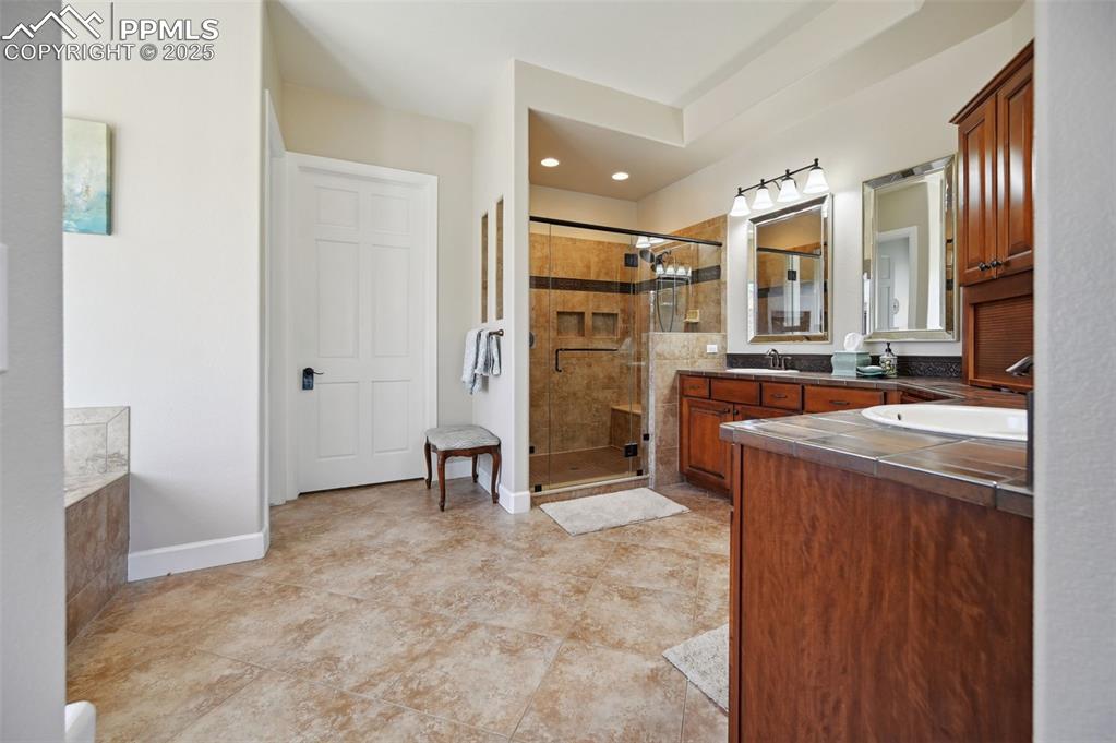 1724 Valley Stream Court Colorado Springs, CO 80921 - Photo 18 of 49 a view of kitchen with stainless steel appliances granite countertop cabinets and outdoor space