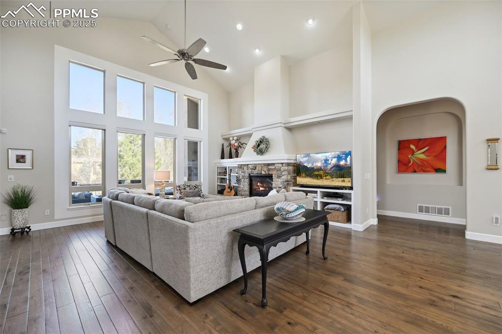 1724 Valley Stream Court Colorado Springs, CO 80921 - Photo 3 of 49 a living room with furniture and a wooden floor