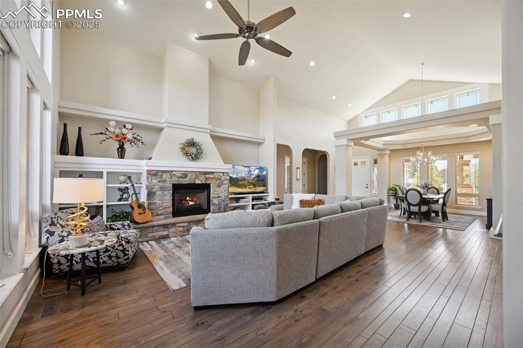 1724 Valley Stream Court Colorado Springs, CO 80921 - Photo 4 of 49 a living room with furniture and fireplace