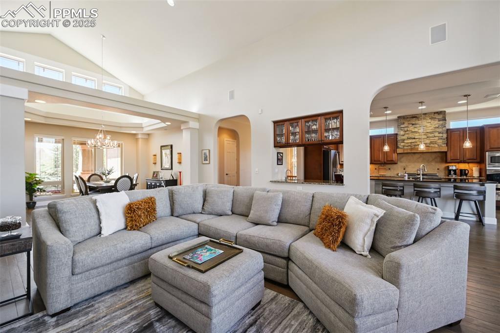 1724 Valley Stream Court Colorado Springs, CO 80921 - Photo 5 of 49 a living room with furniture and view of kitchen