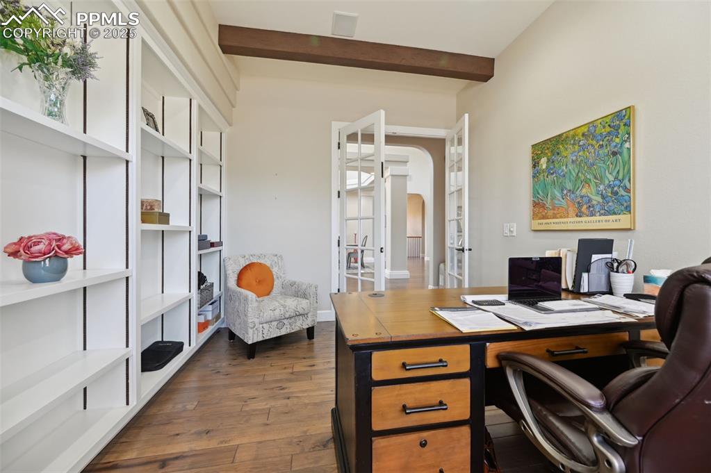 1724 Valley Stream Court Colorado Springs, CO 80921 - Photo 8 of 49 a bedroom with furniture and a window