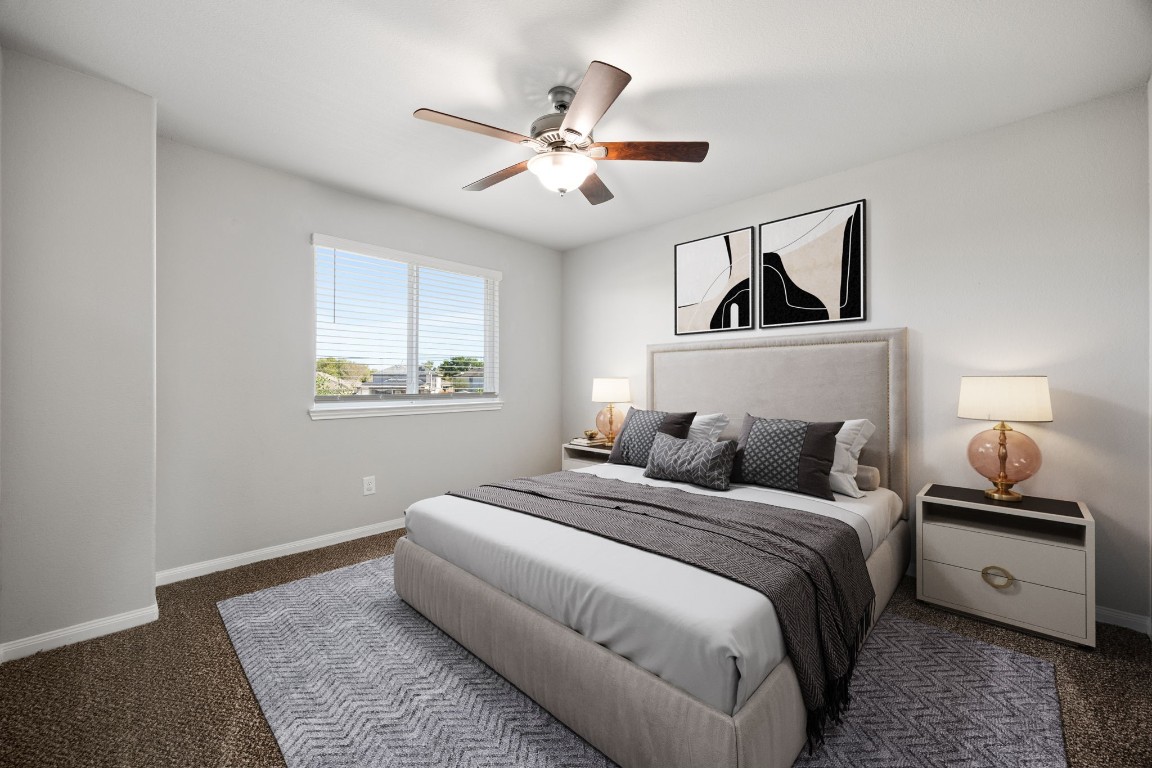 18606 Lansdowne Stream Path Katy, TX 77449 - Photo 12 of 39 Generously sized secondary bedroom featuring large windows