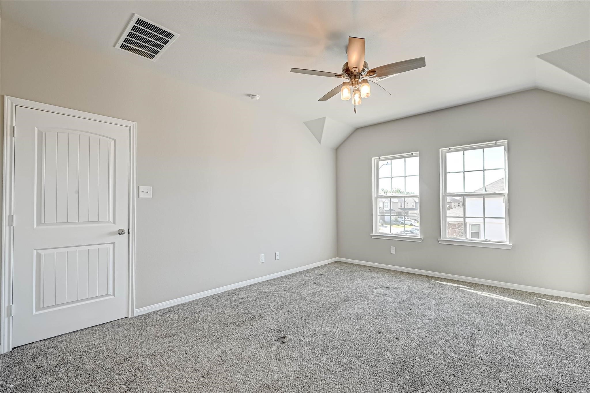 18606 Lansdowne Stream Path Katy, TX 77449 - Photo 28 of 39 a view of an empty room with a window