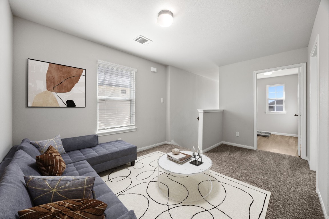 18606 Lansdowne Stream Path Katy, TX 77449 - Photo 10 of 39 Upstairs opens to a spacious gameroom perfect for relaxing and lounging.