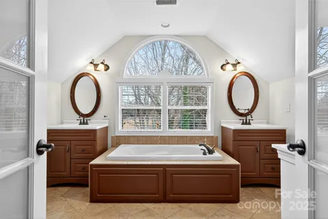 a view of a bath tub sitting in a bathroom