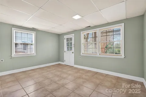 an empty room with windows