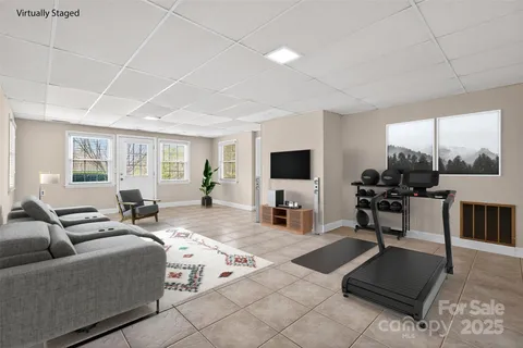 a view of an empty room with windows