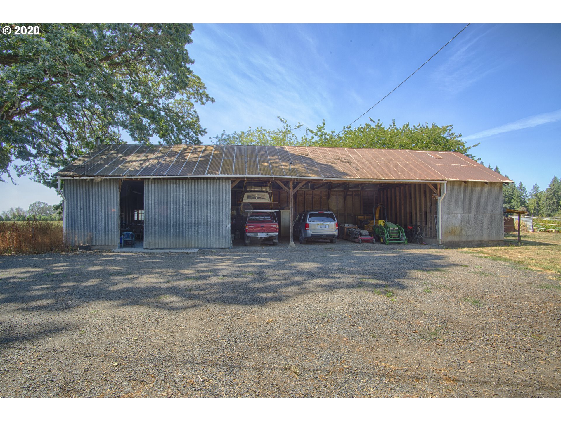 6315 Southeast Whiteson Road Amity, OR 97101 - Photo 20 of 30 a front view of a house with a yard and garage