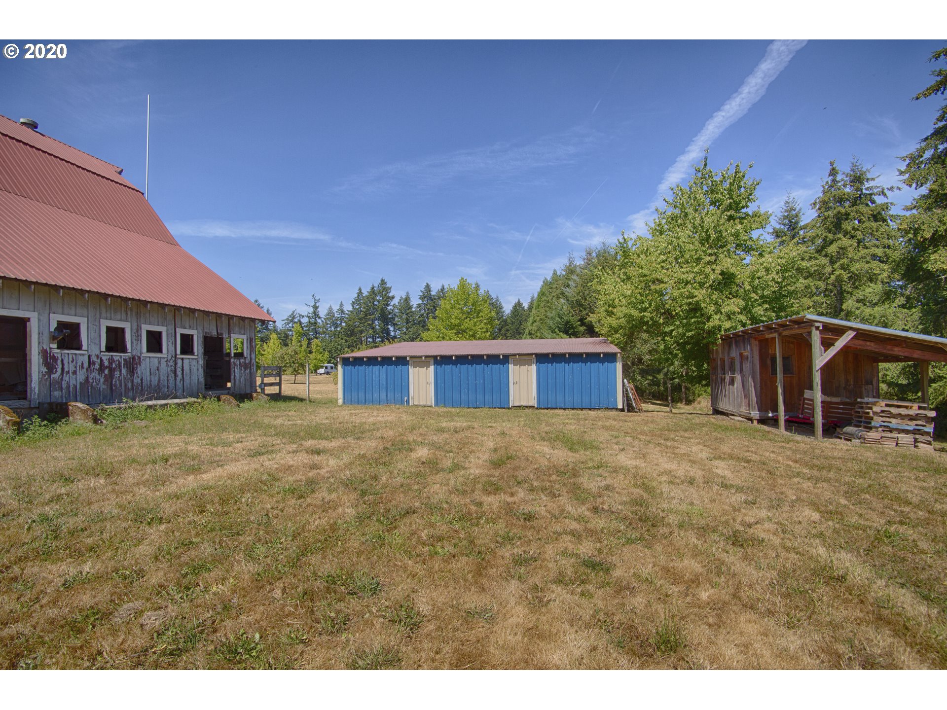6315 Southeast Whiteson Road Amity, OR 97101 - Photo 23 of 30 a view of a house with a yard and garage