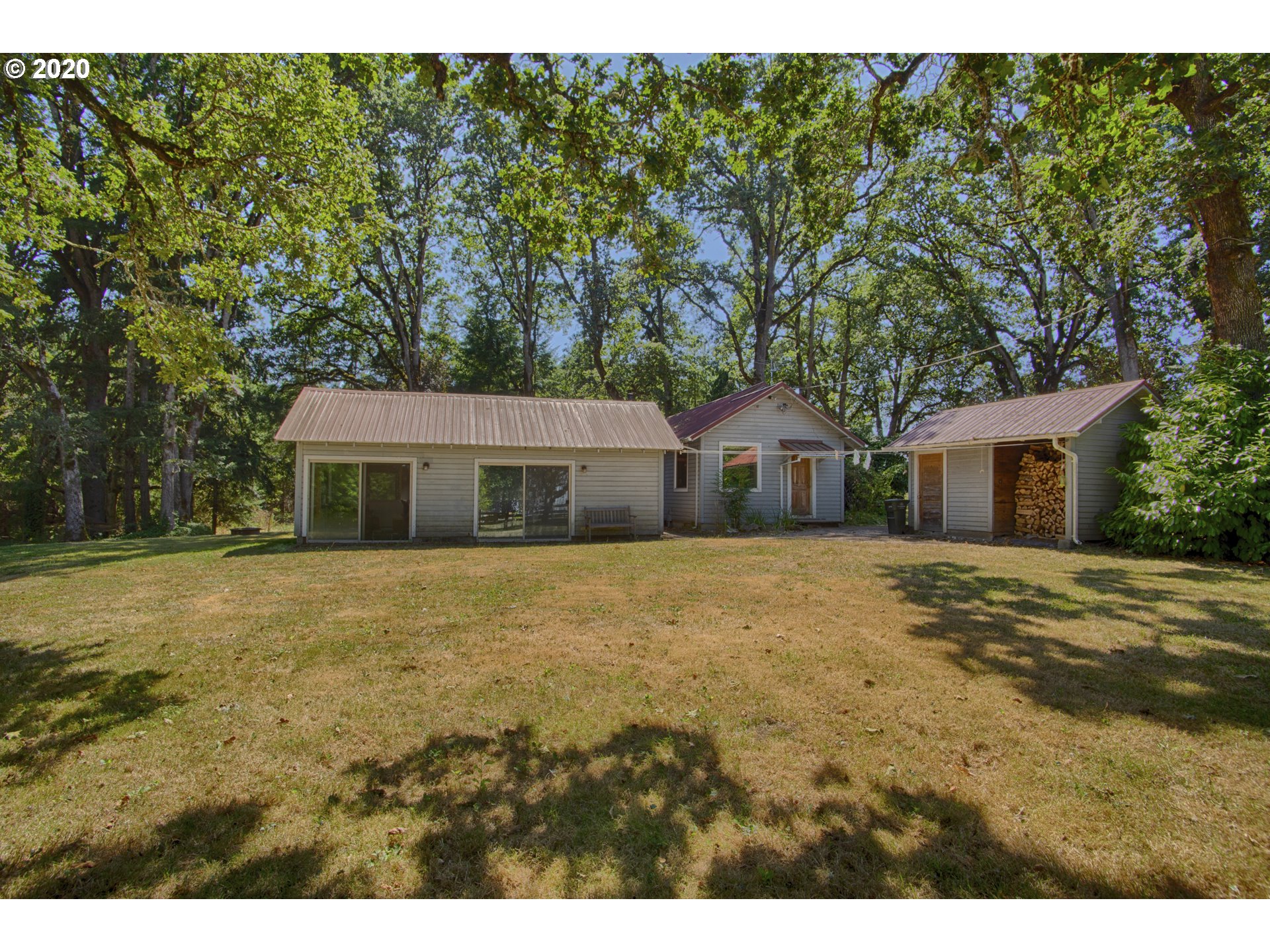 6315 Southeast Whiteson Road Amity, OR 97101 - Photo 30 of 30 a front view of a house with a garden