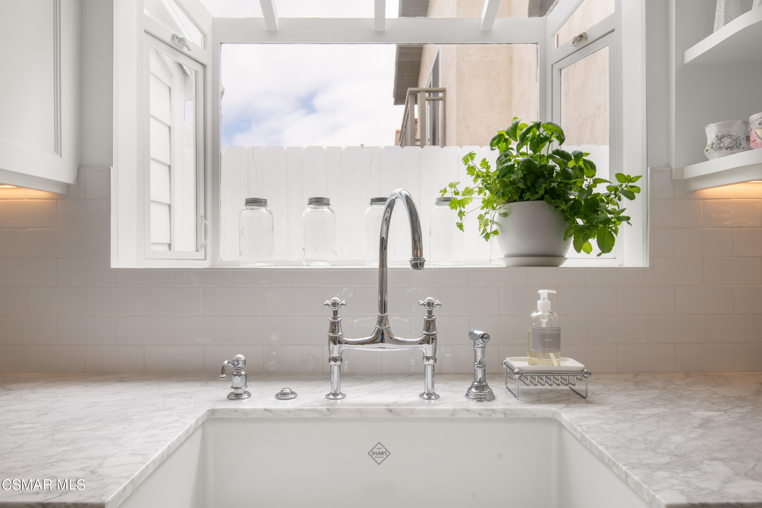 132 Santa Rosa Avenue Oxnard, CA 93035 - Photo 11 of 28 a bathroom with a sink a vanity and a mirror