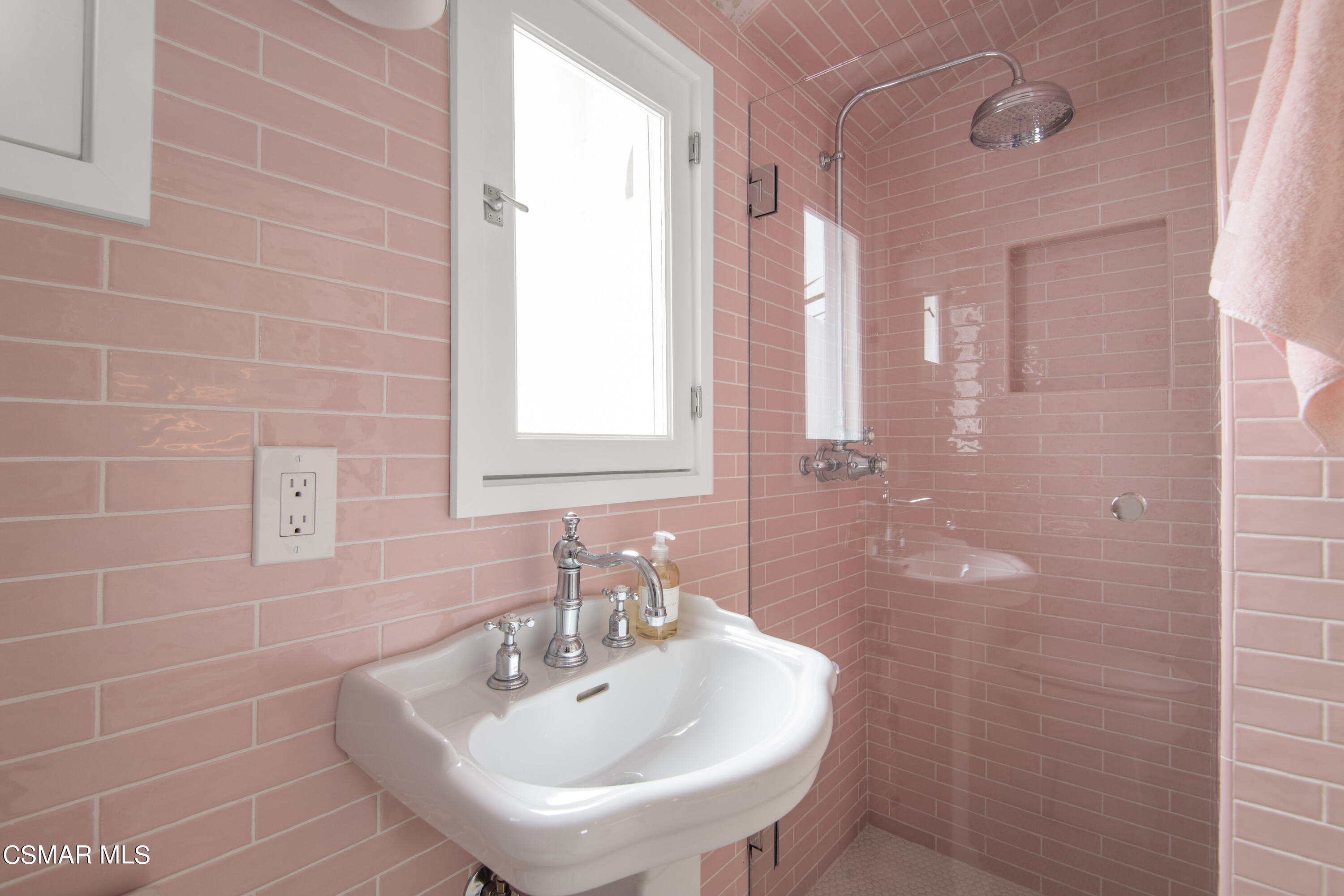 132 Santa Rosa Avenue Oxnard, CA 93035 - Photo 12 of 28 a bathroom with a sink a mirror and a shower