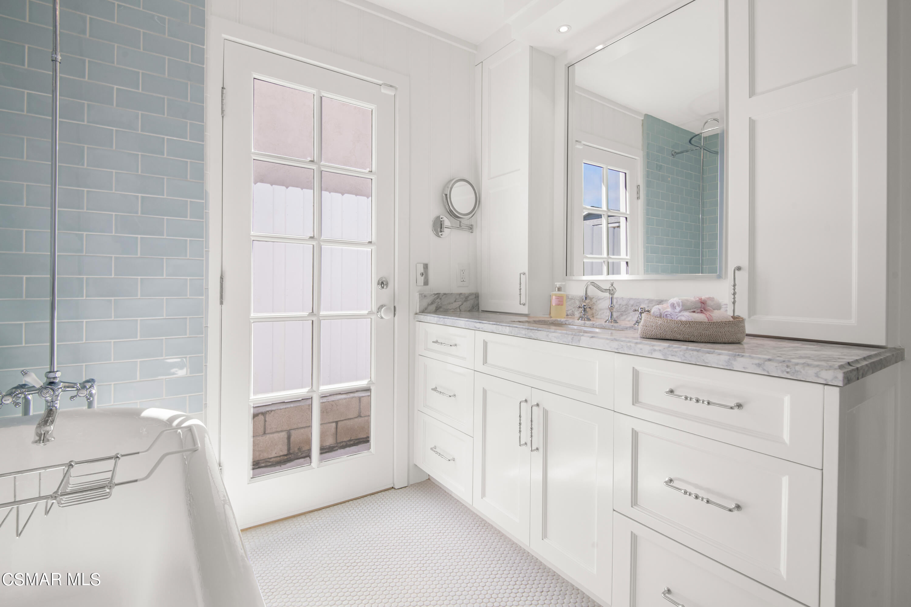 132 Santa Rosa Avenue Oxnard, CA 93035 - Photo 16 of 28 a spacious bathroom with a granite countertop sink a mirror and a