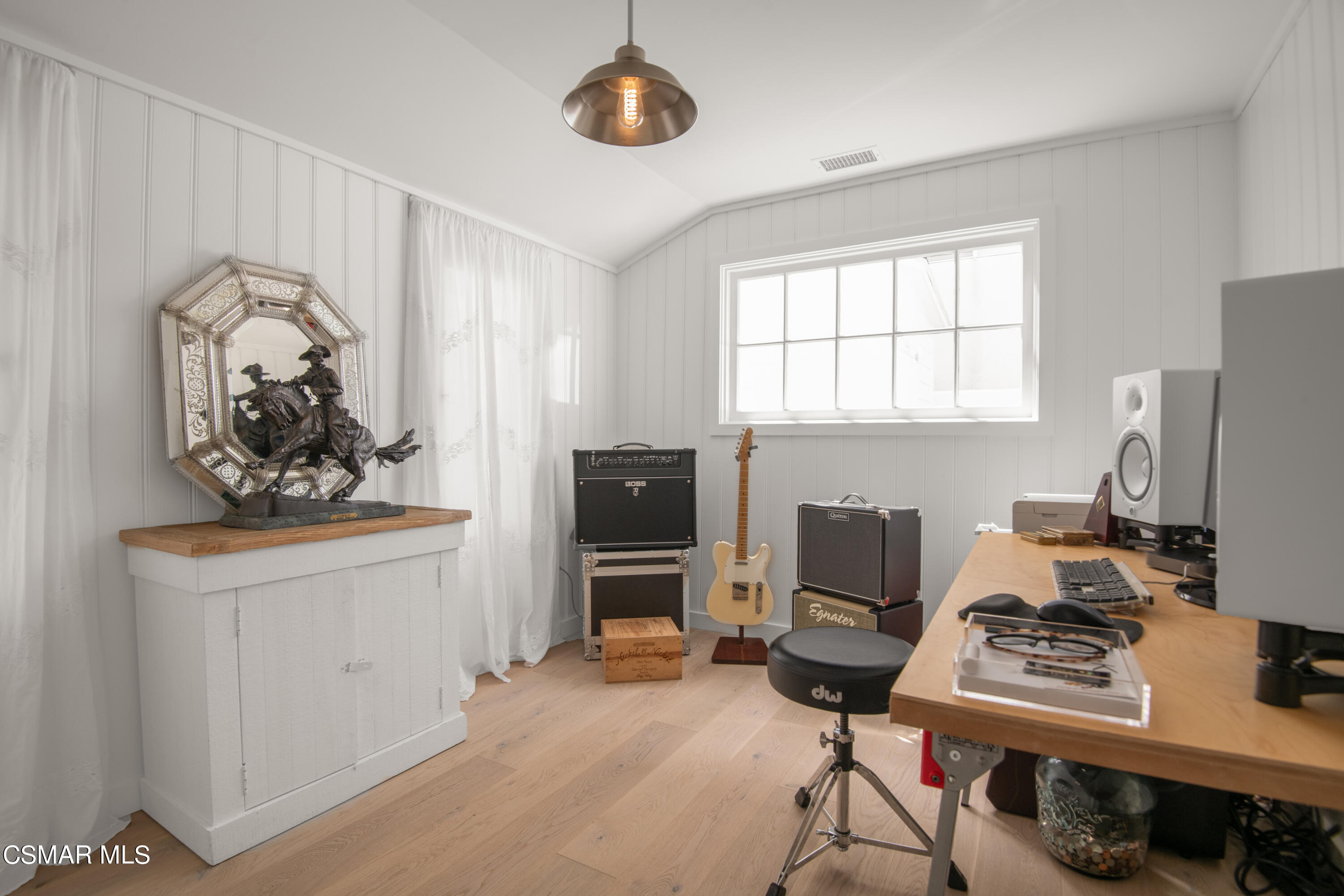 132 Santa Rosa Avenue Oxnard, CA 93035 - Photo 18 of 28 a view of workspace with wooden floor windows