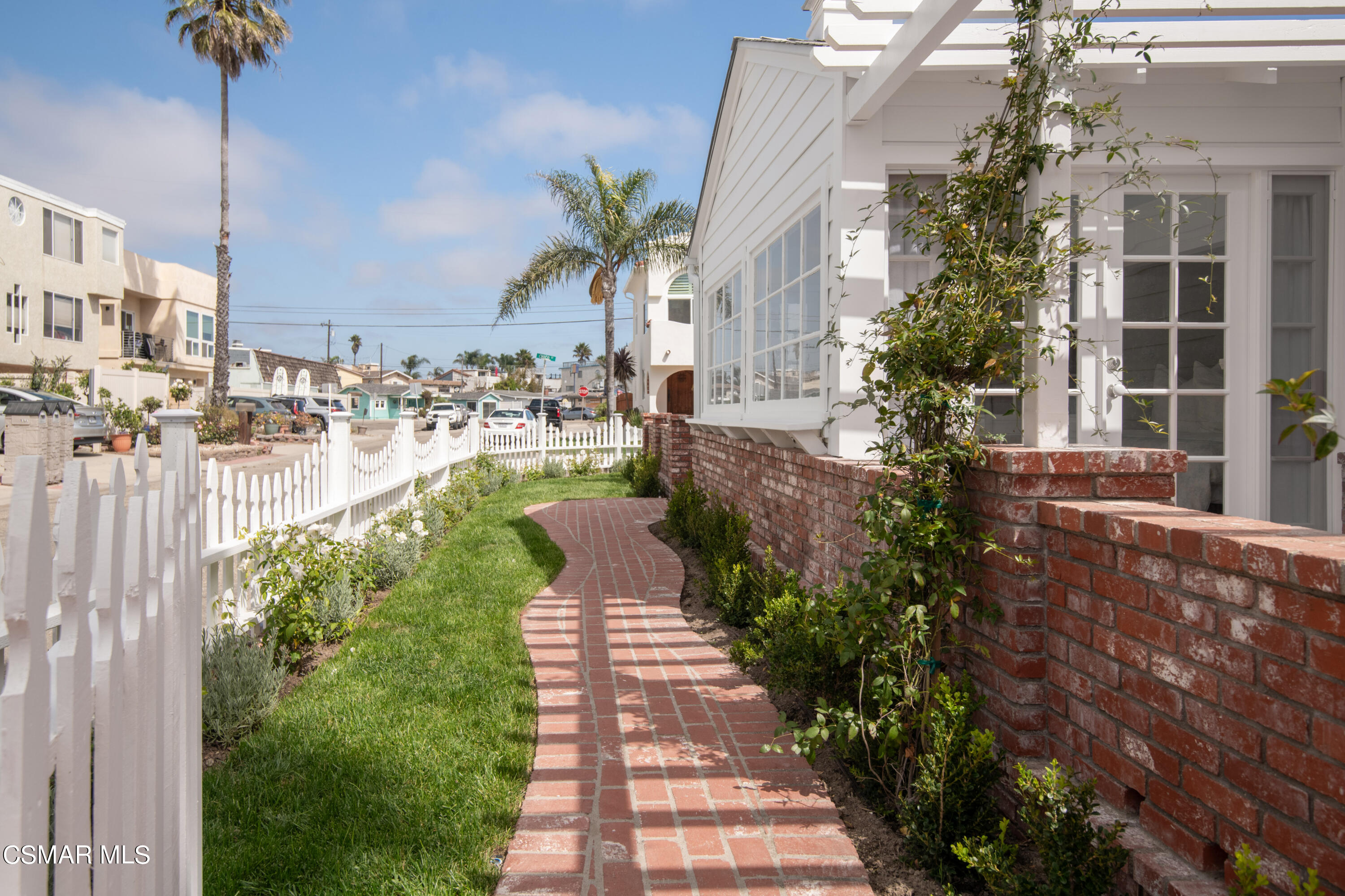 132 Santa Rosa Avenue Oxnard, CA 93035 - Photo 19 of 28 a view of a house with a yard and pathway
