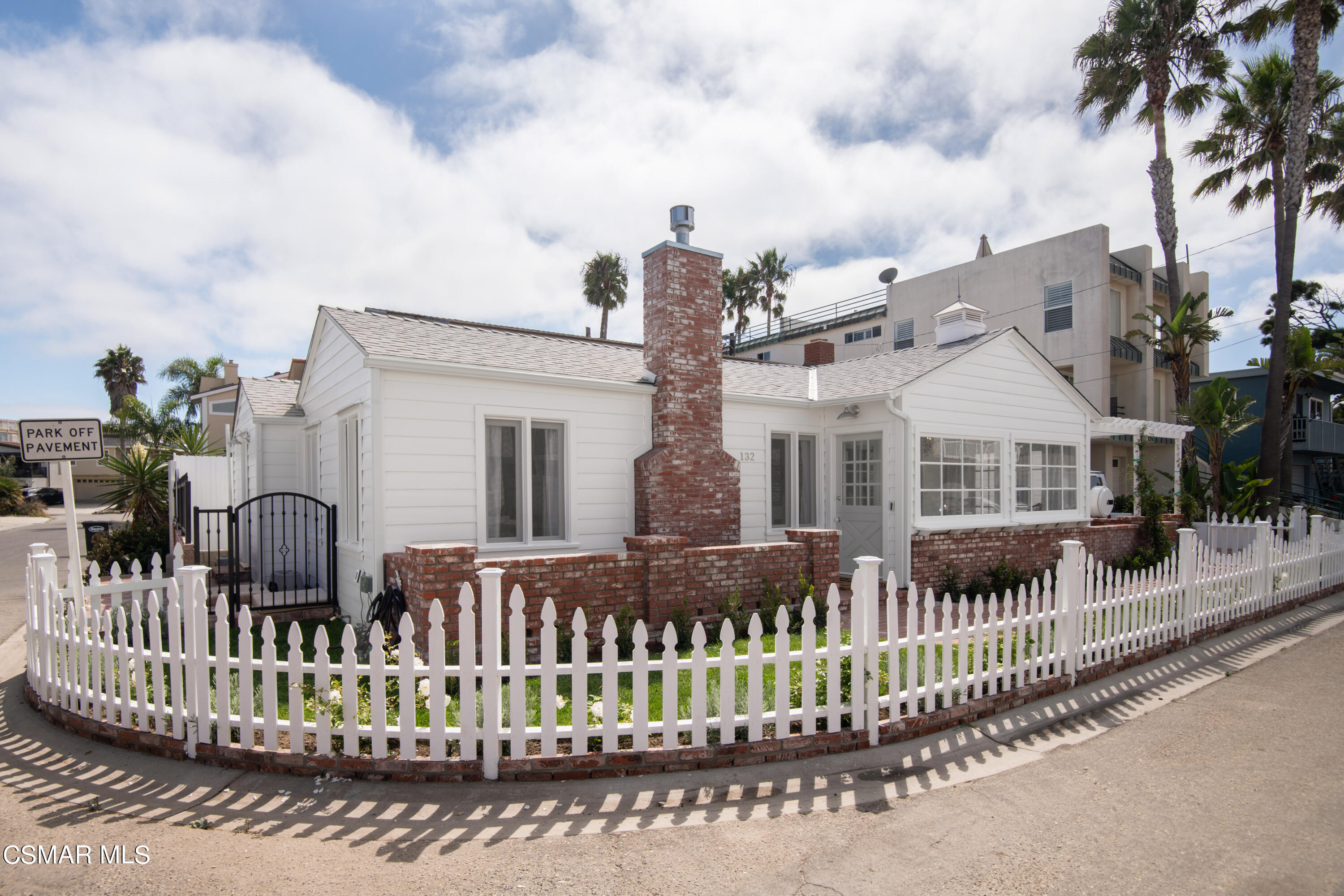 132 Santa Rosa Avenue Oxnard, CA 93035 - Photo 23 of 28 a front view of house with a garden