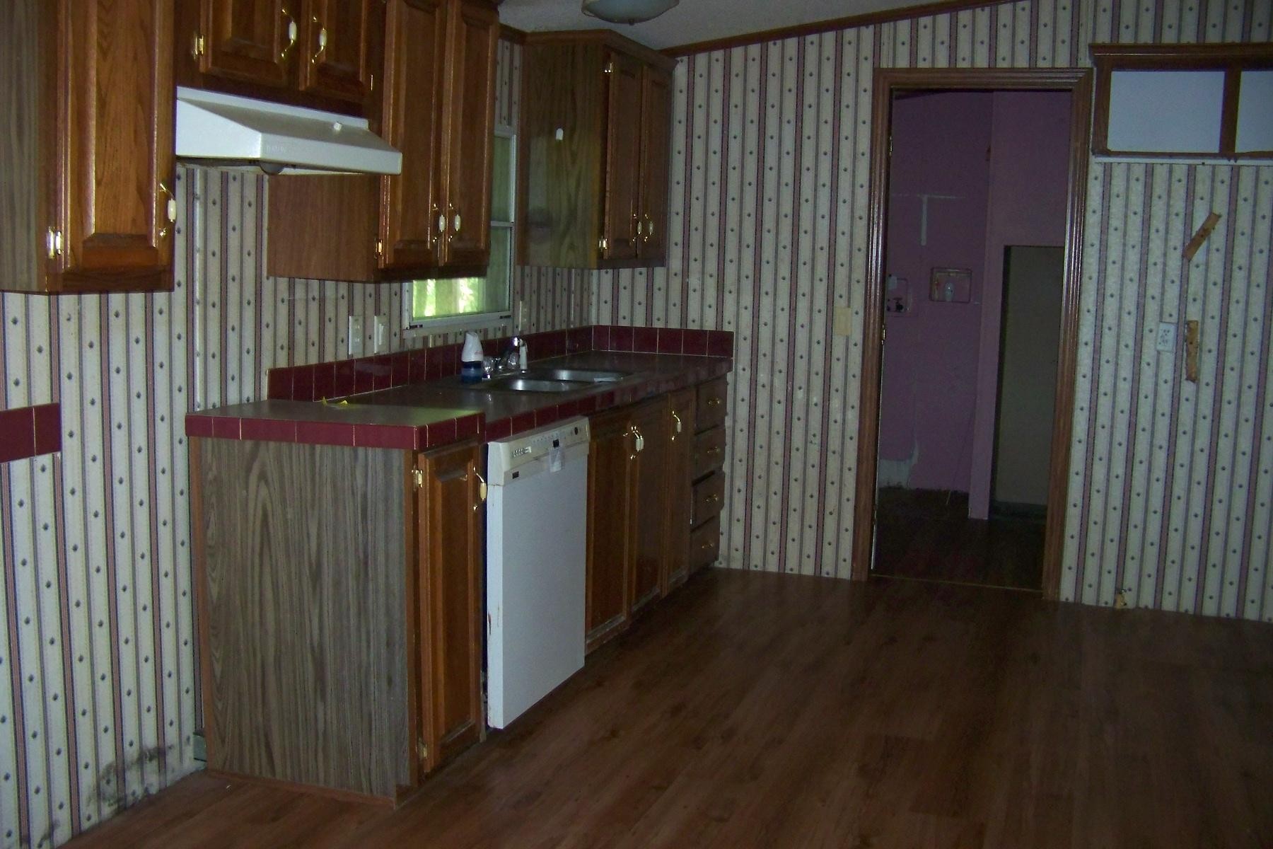 568 Farm Loop Road New Market, TN 37820 - Photo 7 of 13 a kitchen with a sink and cabinets