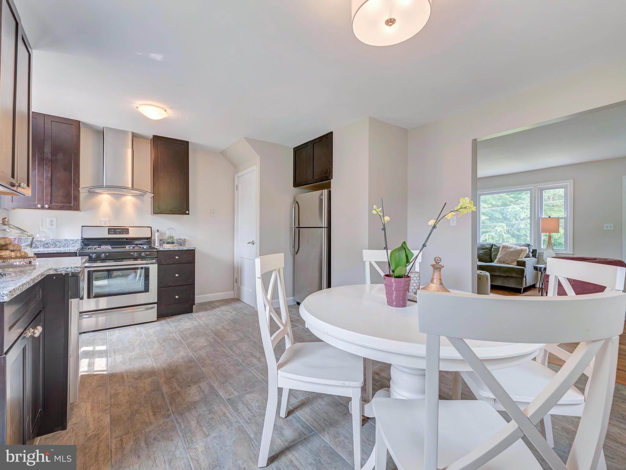 Espresso wood cabinets with granite counters