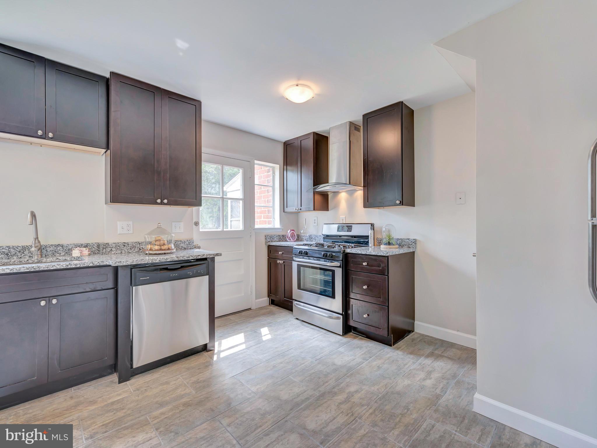 3031 Medway Street Silver Spring, MD 20902 - Photo 10 of 30 Travertine flooring