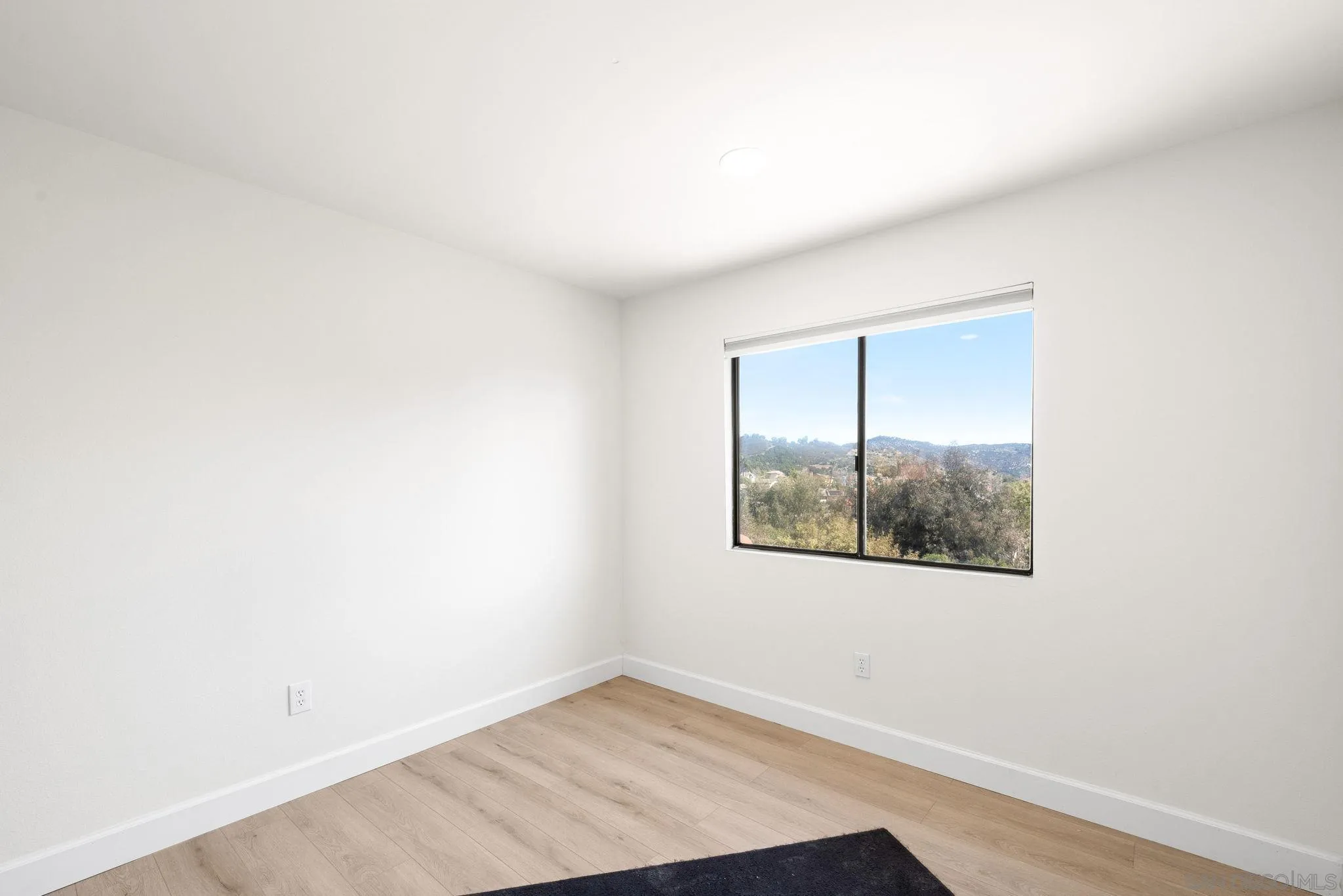 1436 Timber Escondido, CA 92027 - Photo 25 of 44 an empty room with a window