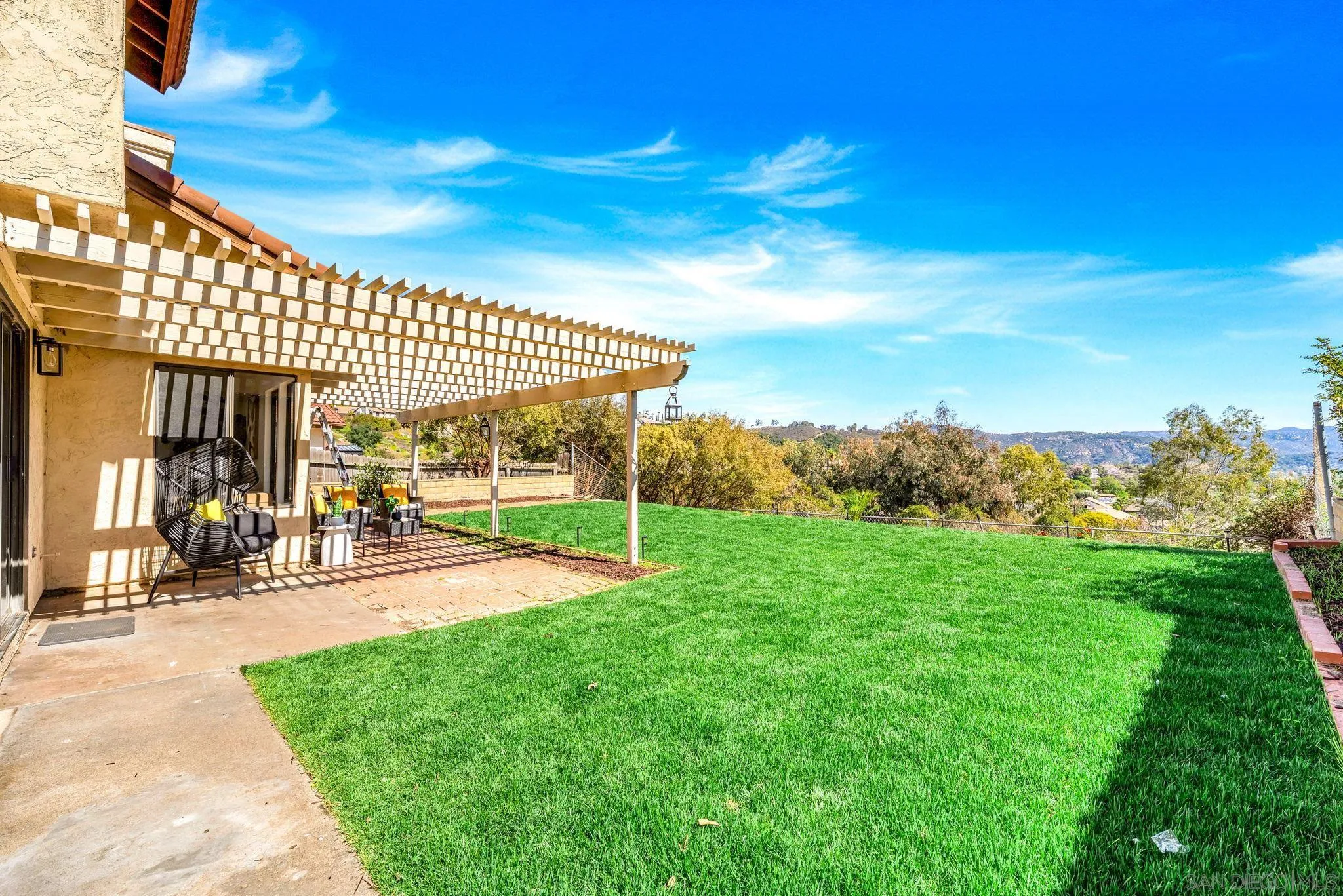 1436 Timber Escondido, CA 92027 - Photo 31 of 44 a view of a patio with a table and chairs