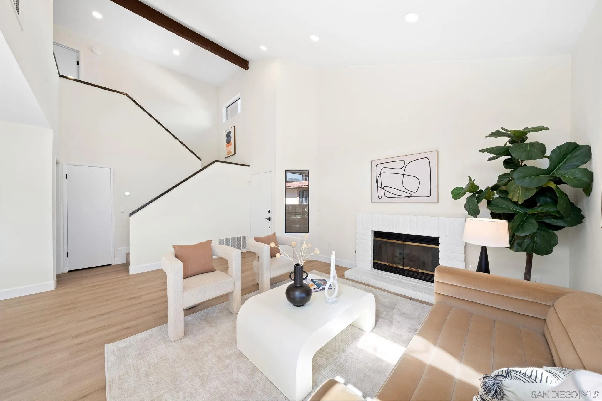 1436 Timber Escondido, CA 92027 - Photo 7 of 44 a living room with furniture a fireplace and a potted plant