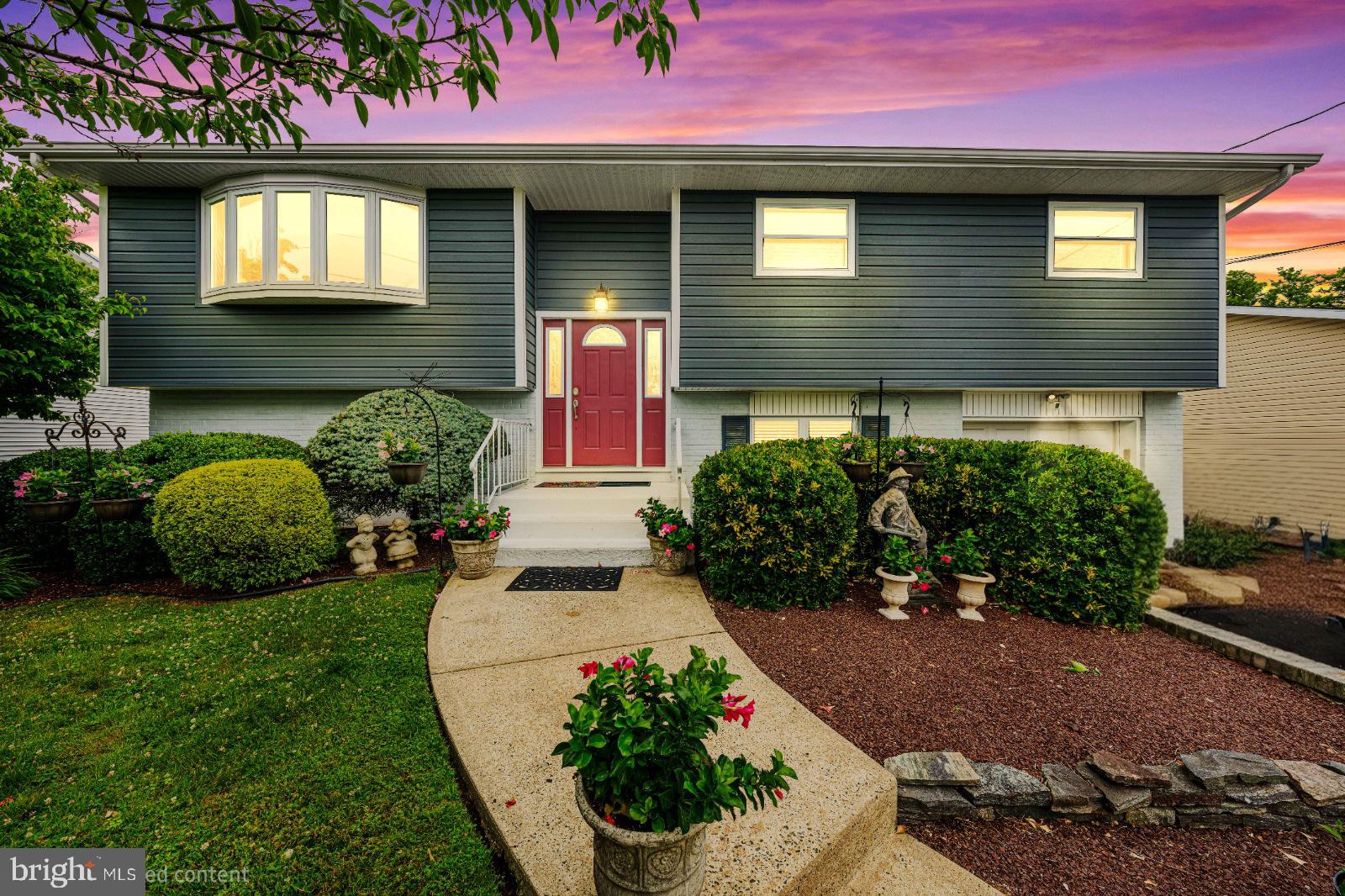 8 Dan Road Hamilton, NJ 08620 - Photo 2 of 49 Charming home with vibrant sunset glow.