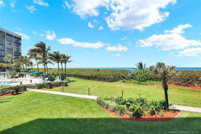 a view of a lake with a big yard