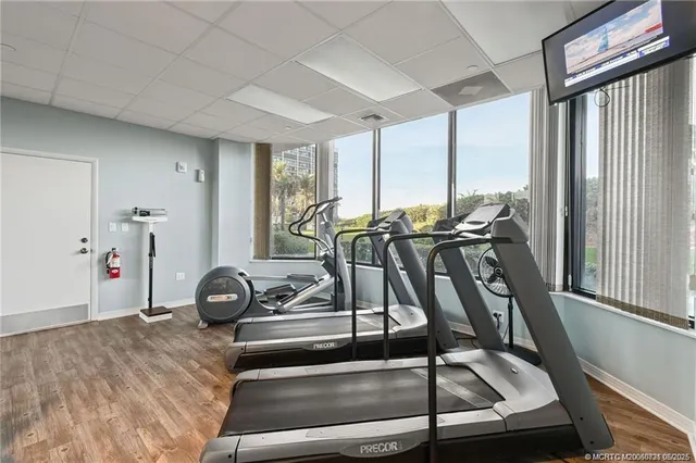 a view of a lobby with furniture and a chandelier