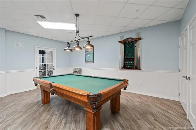 a very nice looking dining room with a table and chairs