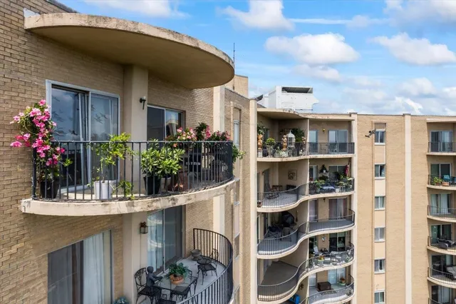 a view of a house with a potted plant