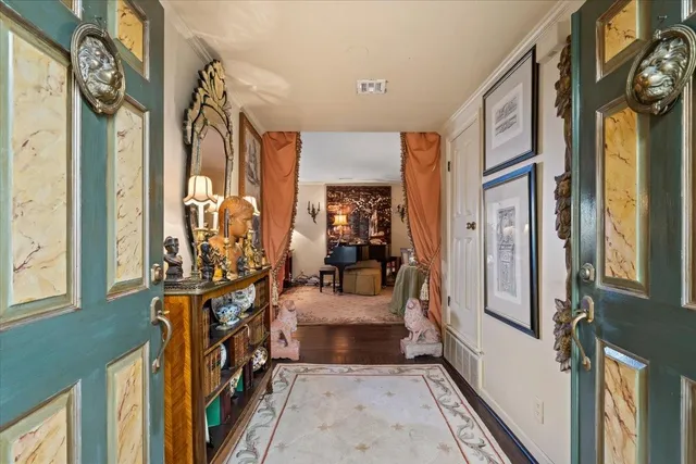a view of an entryway with a chandelier