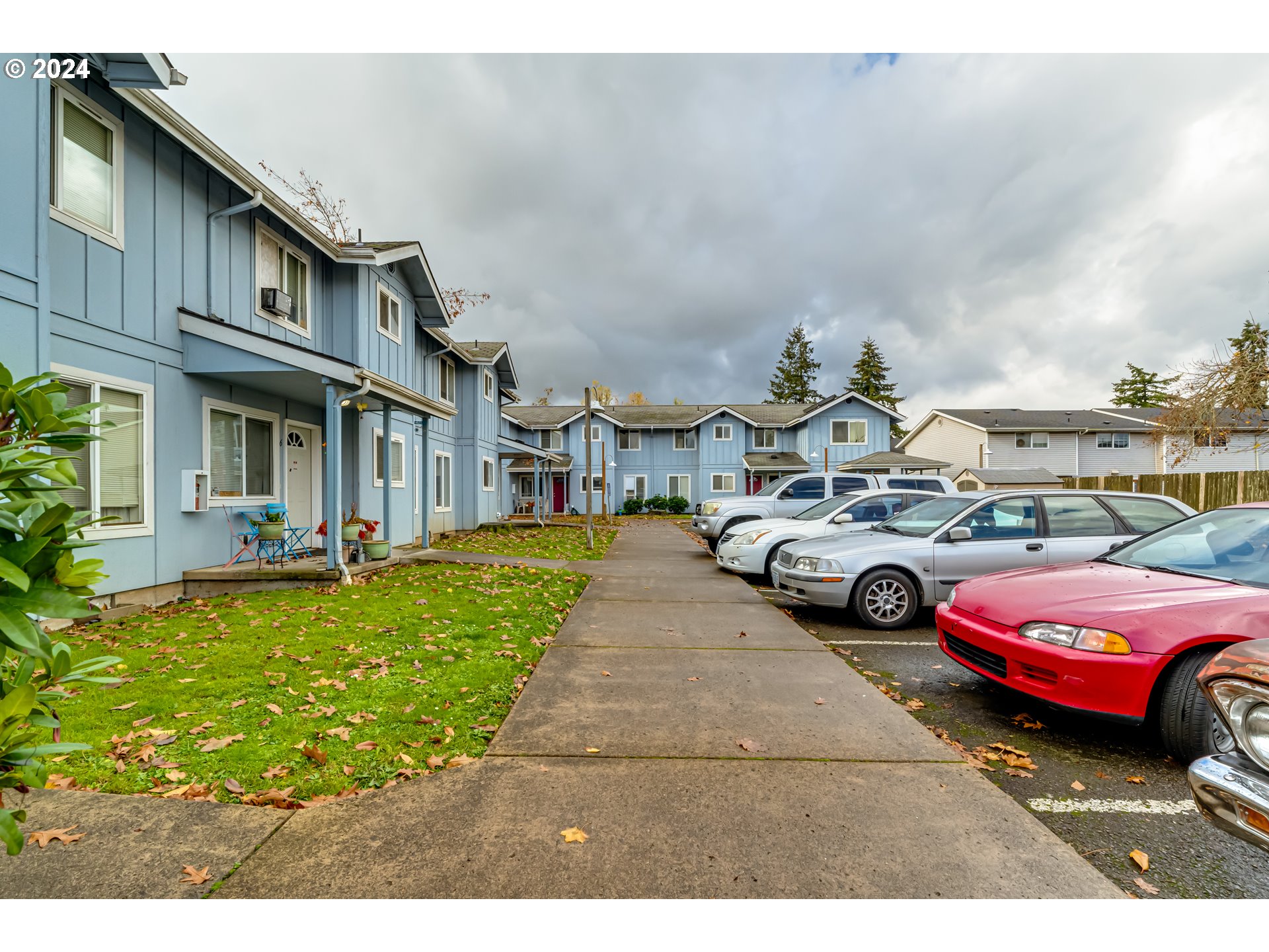 249 South 41st Place Springfield, OR 97478 - Photo 11 of 17 a view of a cars park in front of a house