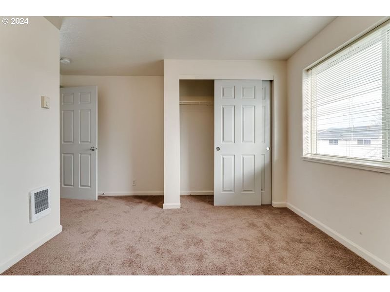 249 South 41st Place Springfield, OR 97478 - Photo 14 of 17 a view of an empty room with a window