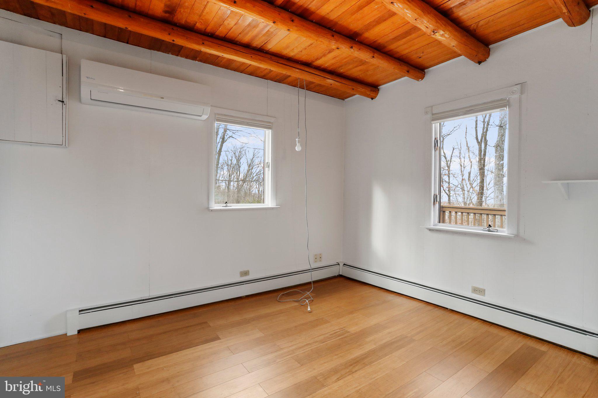 412 Valley View Road Harpers Ferry, WV 25425 - Photo 20 of 39 a view of a room with wooden floor and windows