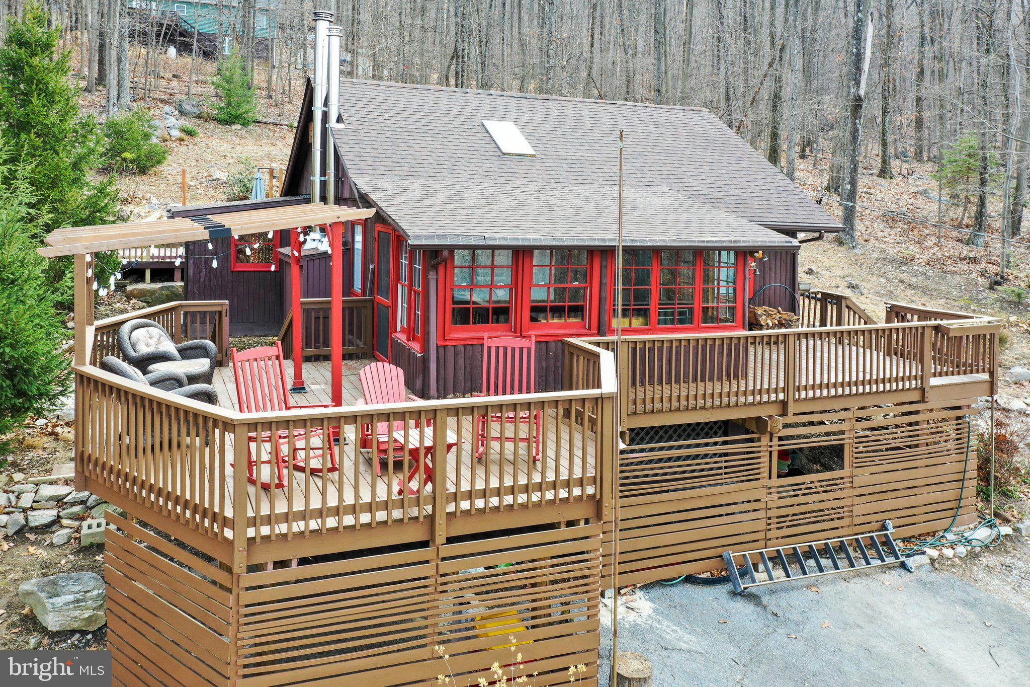 412 Valley View Road Harpers Ferry, WV 25425 - Photo 2 of 39 a view of a chairs and tables in the balcony