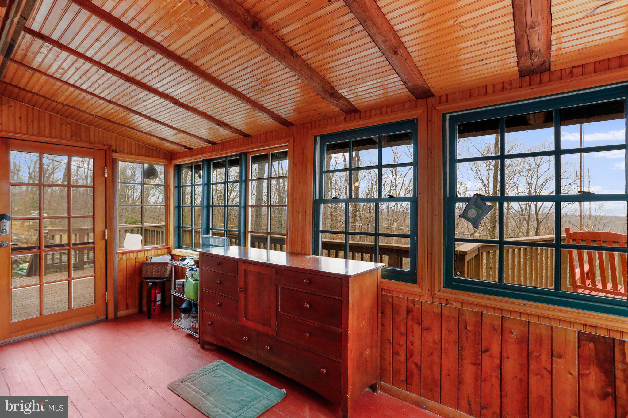 412 Valley View Road Harpers Ferry, WV 25425 - Photo 34 of 39 a room with furniture and large windows