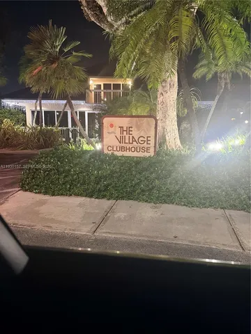 a sign that is on the side of a building