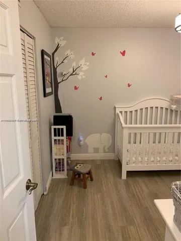 a view of livingroom with furniture and wooden floor