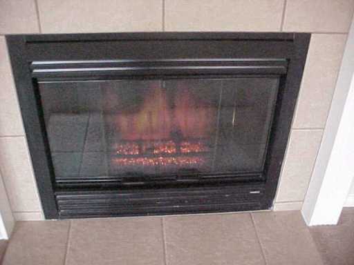 5809 Corsica Road Corpus Christi, TX 78414 - Photo 4 of 10 a view of fireplace with a mirror