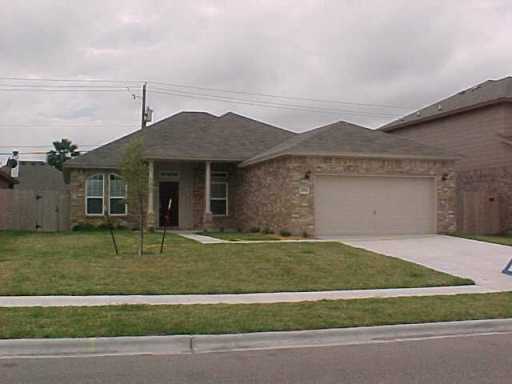 5809 Corsica Road Corpus Christi, TX 78414 - Photo 10 of 10 a front view of a house with a yard