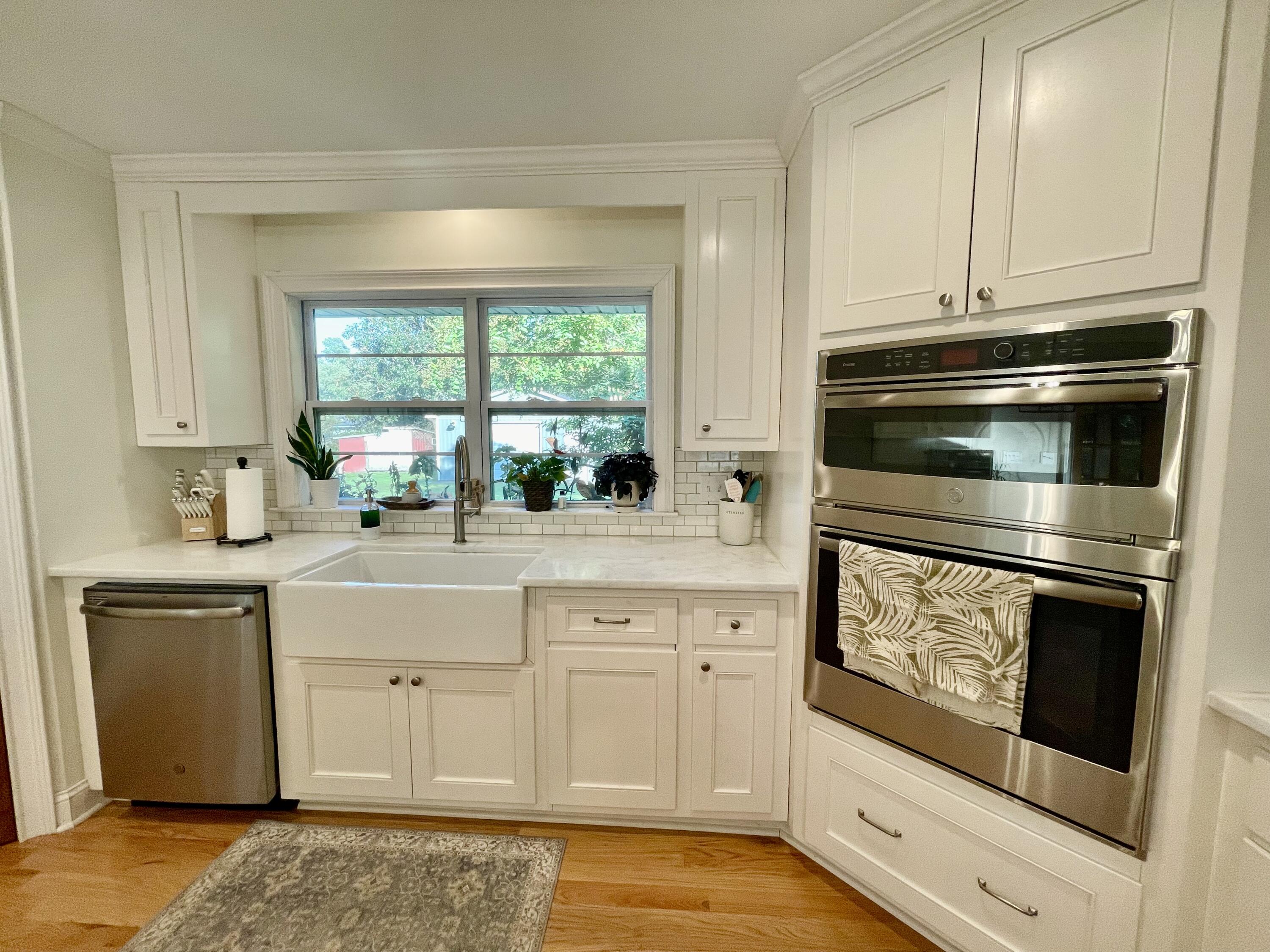 farm sink and quartz countertops