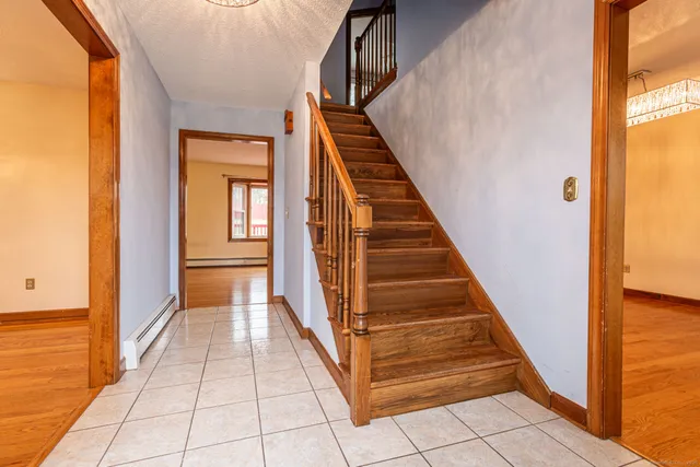 a view of a hallway with windows