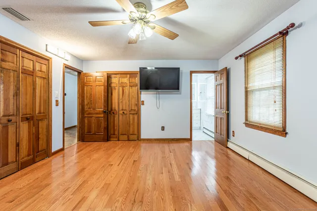a view of a livingroom with a flat screen tv