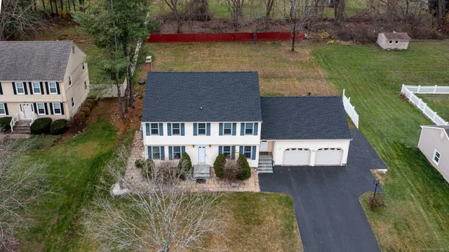 an aerial view of a house with garden