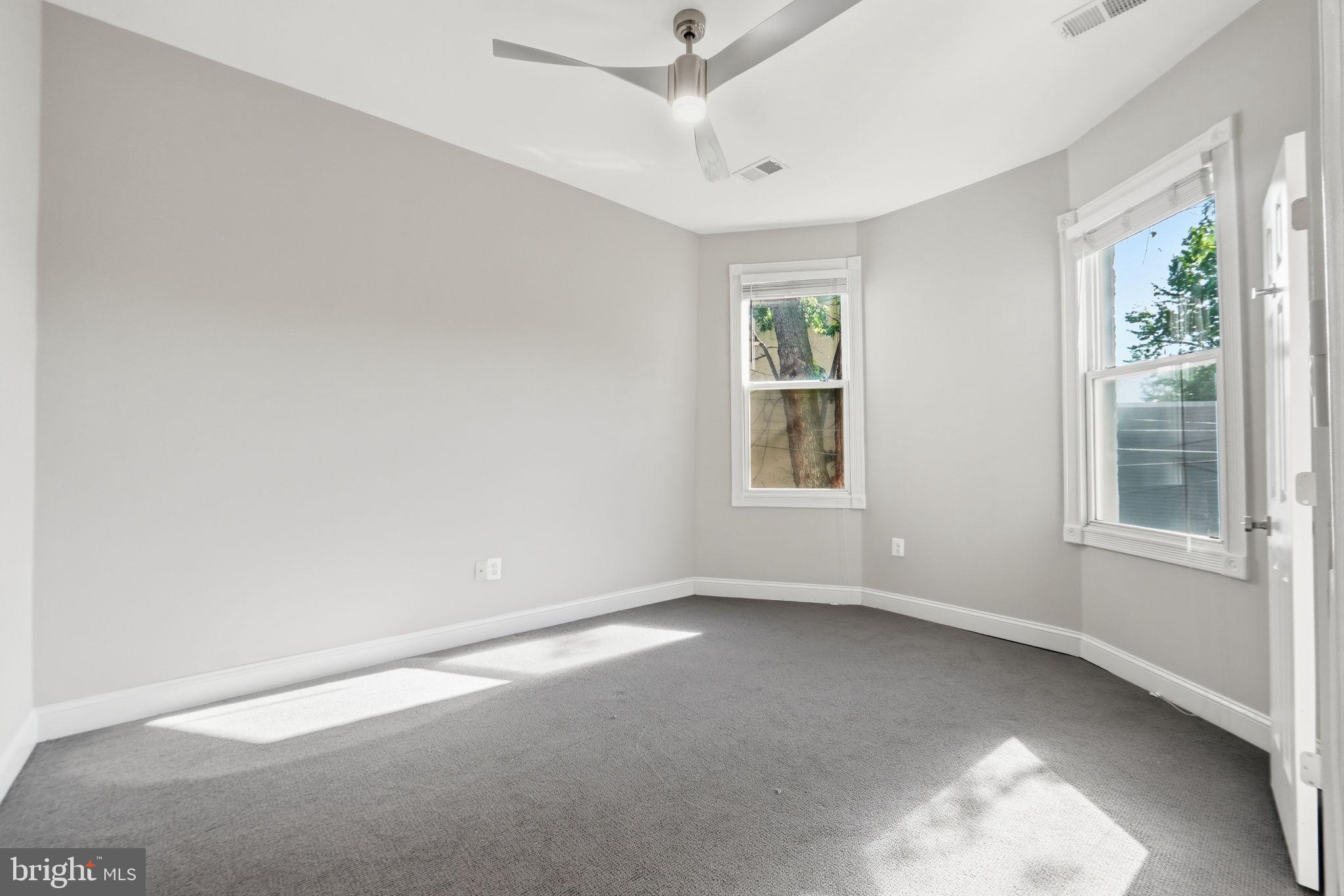 706 12th Street Northeast Washington, DC 20002 - Photo 26 of 49 an empty room with windows and closet